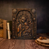 Experience serenity with this wooden depiction of Madonna cradling the Christ Child.